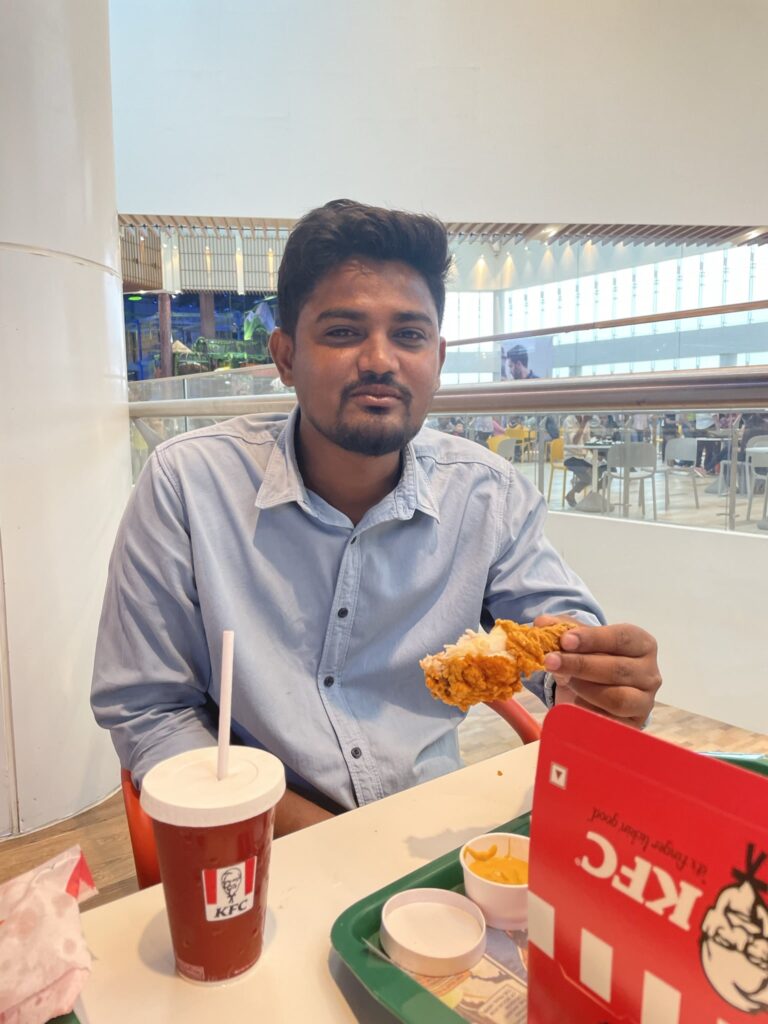 Rajesh eating Chicken at LuLu Mall, lucknow_SKP